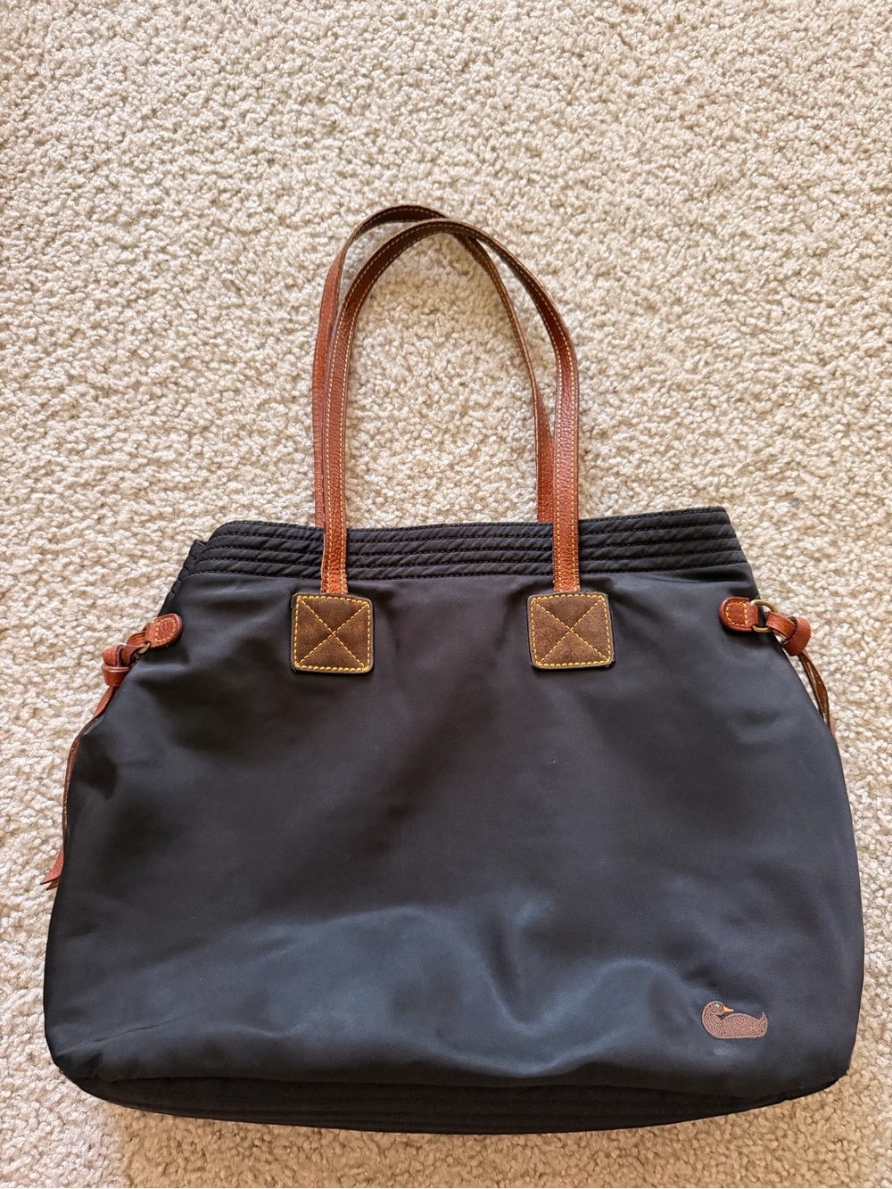 Dooney & Bourke Black Tote with Brown Leather Handles